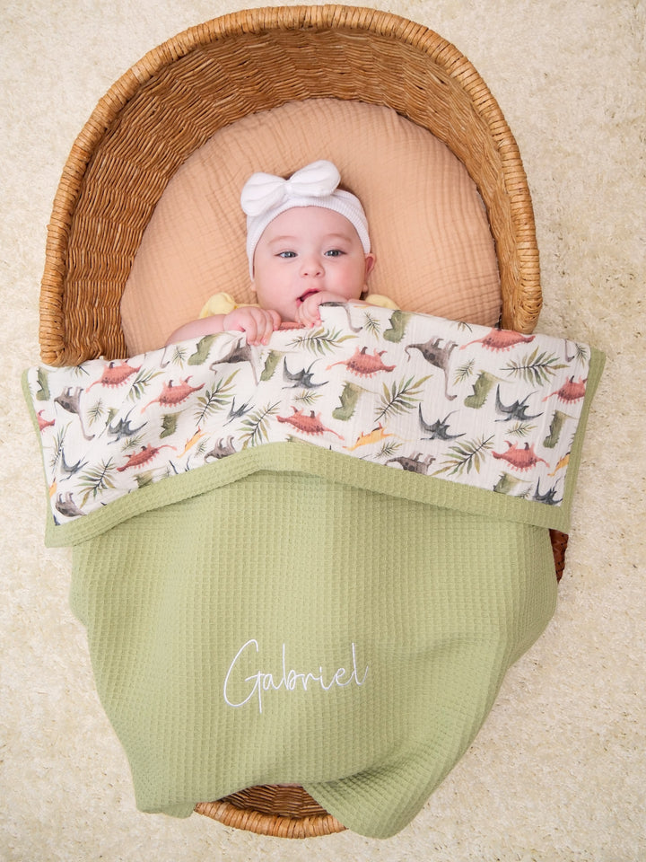 Mouliss personalized sage green waffle baby blanket with dinosaur muslin and embroidered name detail