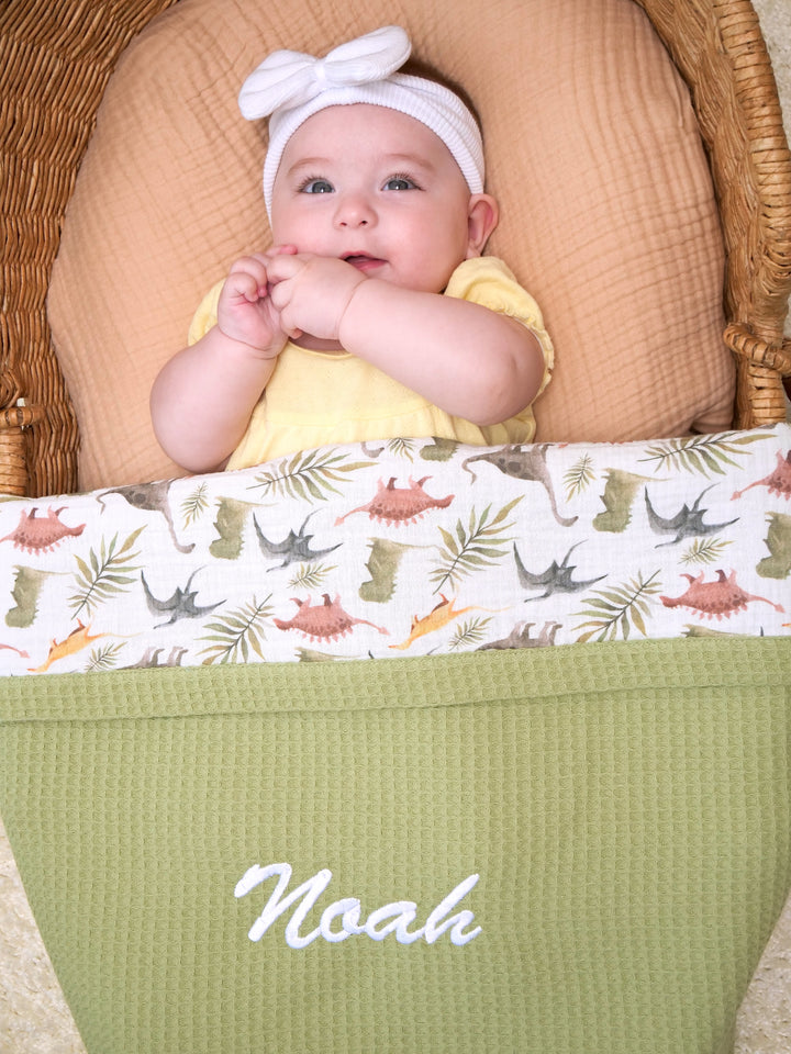 Mouliss personalized green waffle baby blanket with dinosaur print muslin and embroidered name