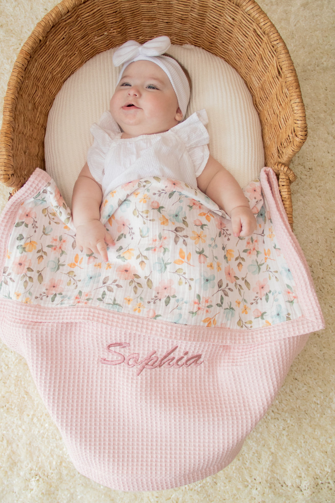 Mouliss personalized pink waffle baby blanket with floral muslin and embroidered name detail