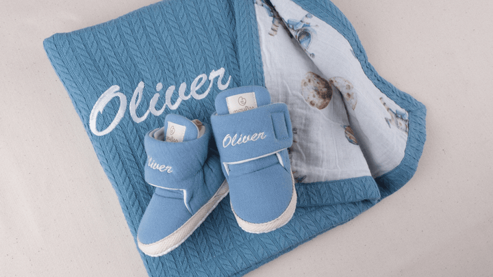 Mouliss Denim Blue muslin personalized baby booties — styling photo 6