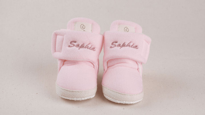 Mouliss Blush Pink muslin personalized baby booties — styling photo 1