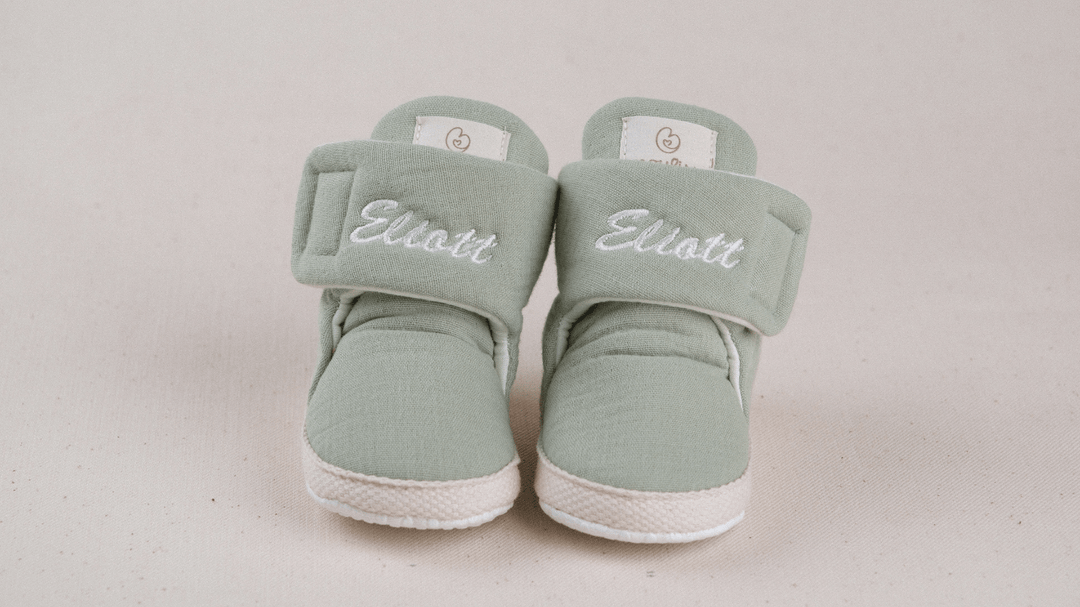 Mouliss Sage Green muslin personalized baby booties — styling photo 1