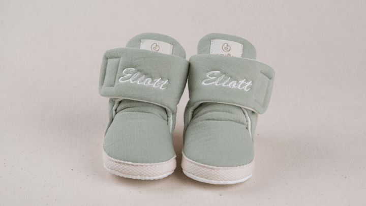 Mouliss Sage Green muslin personalized baby booties — styling photo 1
