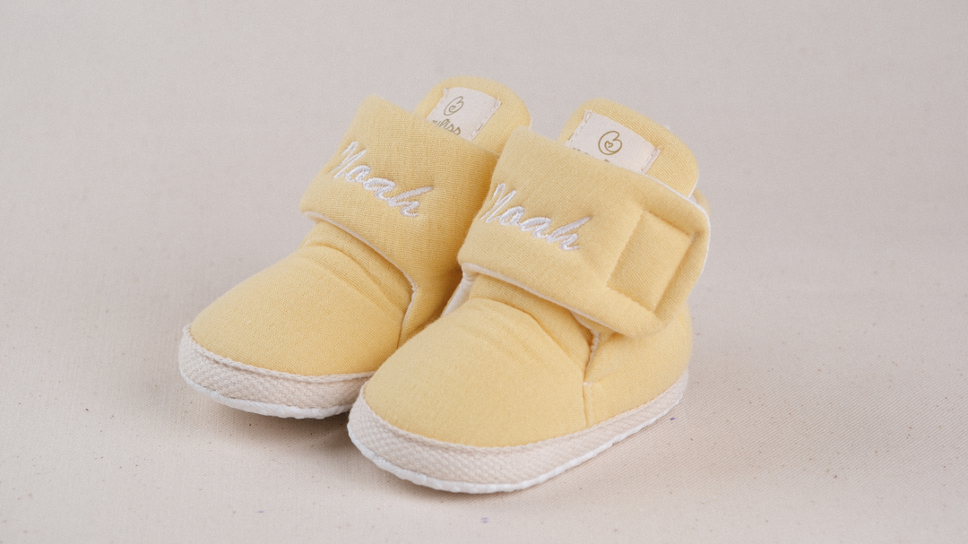 Mouliss Yellow muslin personalized baby booties — styling photo 2
