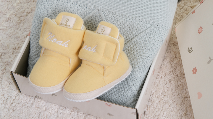 Mouliss Yellow muslin personalized baby booties — styling photo 5