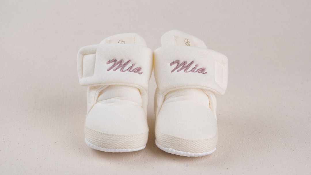Mouliss Cream muslin personalized baby booties — styling photo 2