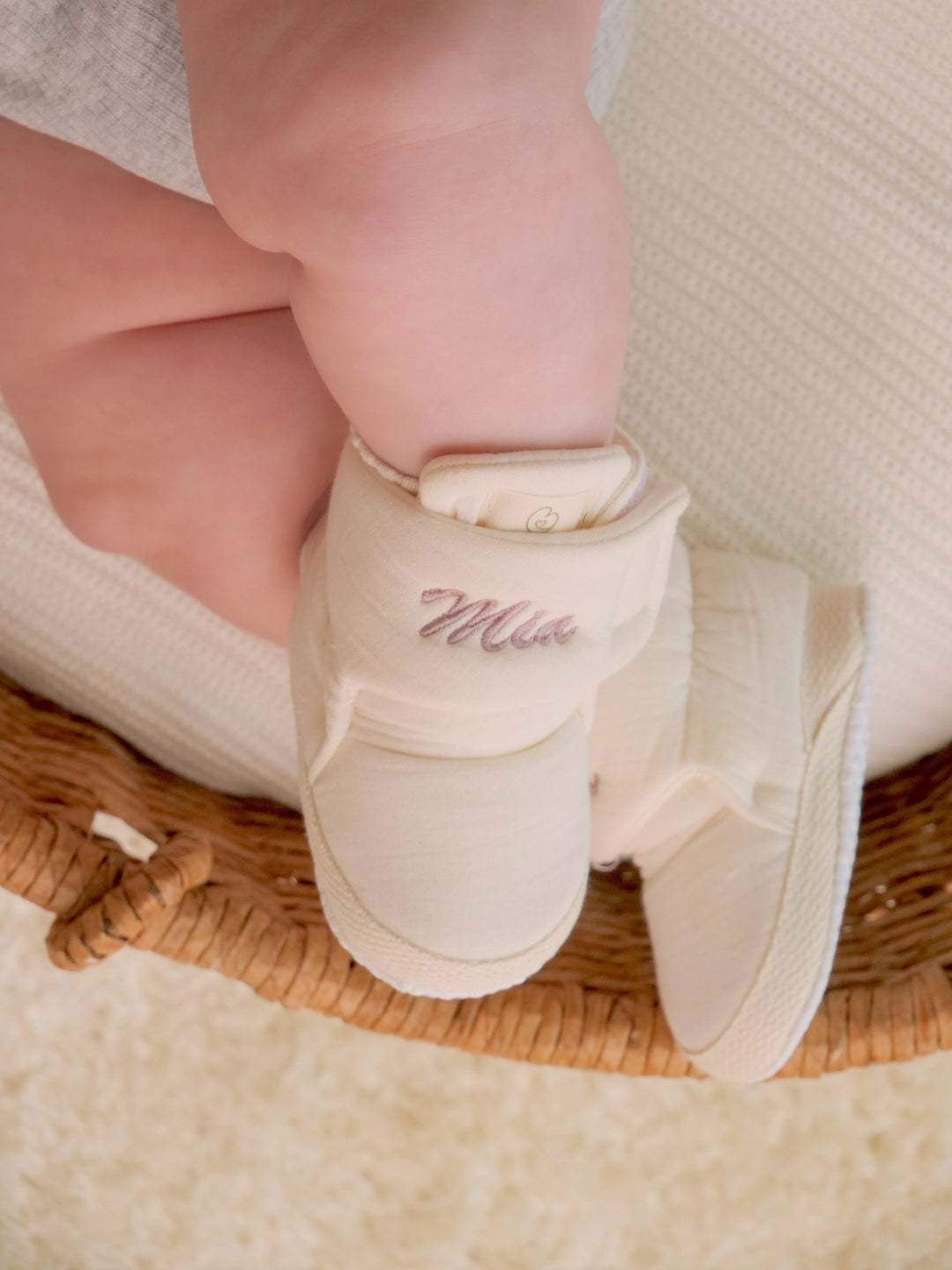 Mouliss embroidered name detail on cream baby booties