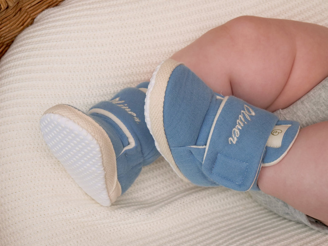 Mouliss embroidered name detail on navy baby booties