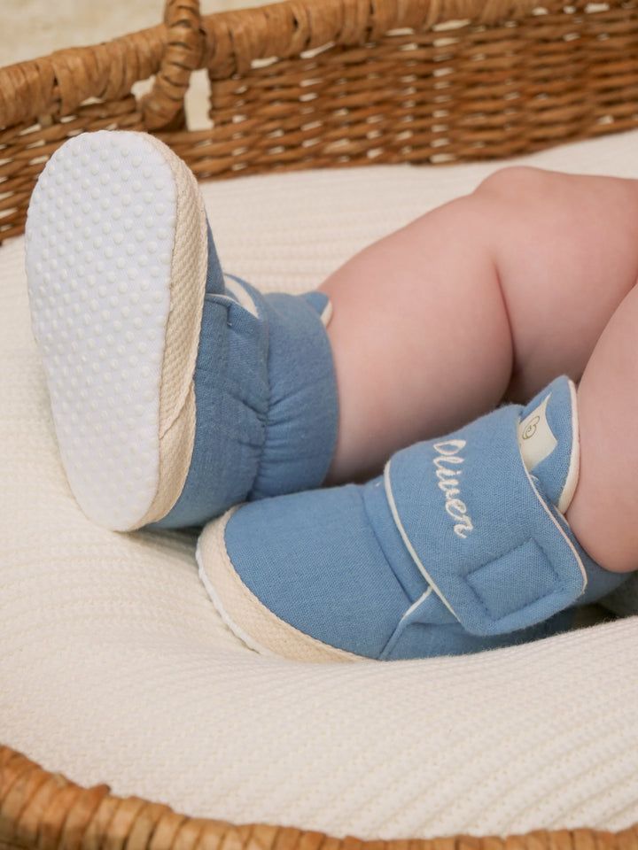 Mouliss personalized navy baby booties with embroidered name, side view
