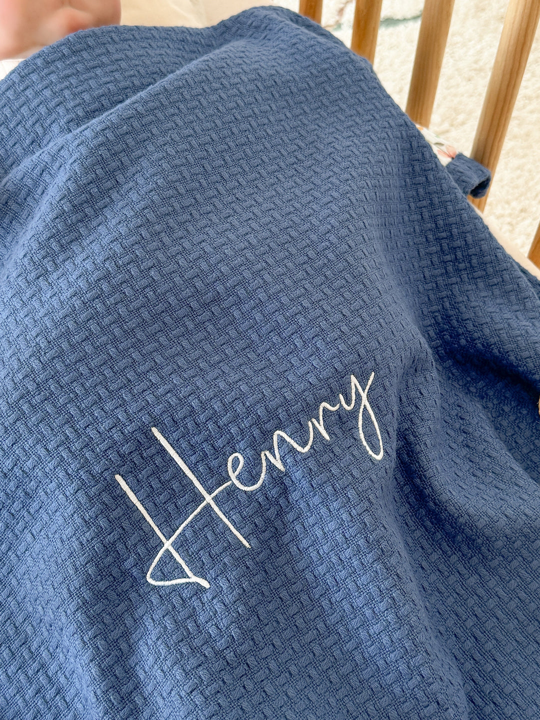 Personalized blue baby blanket by Cotton with white embroidered &