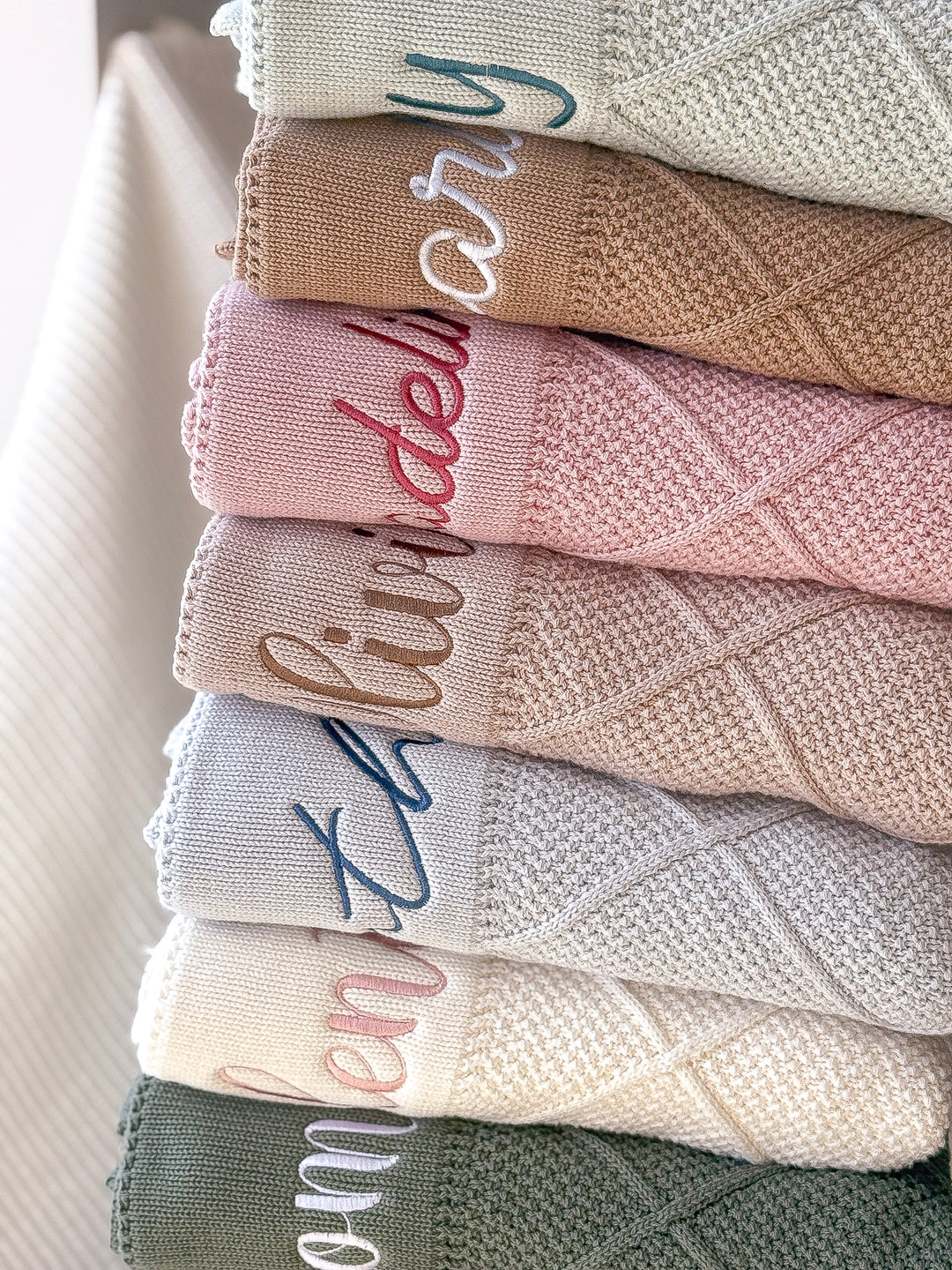 Mouliss diamond knit personalized baby blankets in all available colors layered together