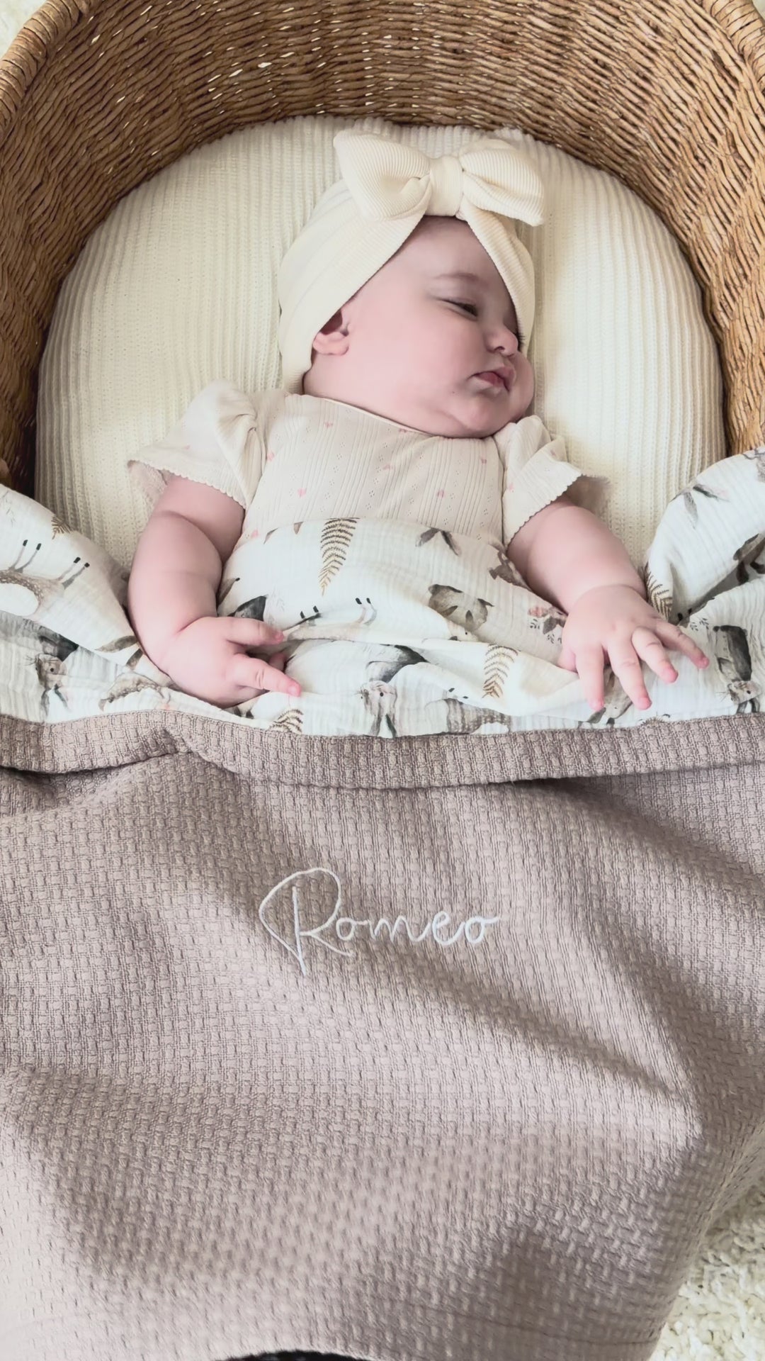 Mouliss personalized taupe waffle baby blanket with woodland muslin, embroidered name, shown in basket