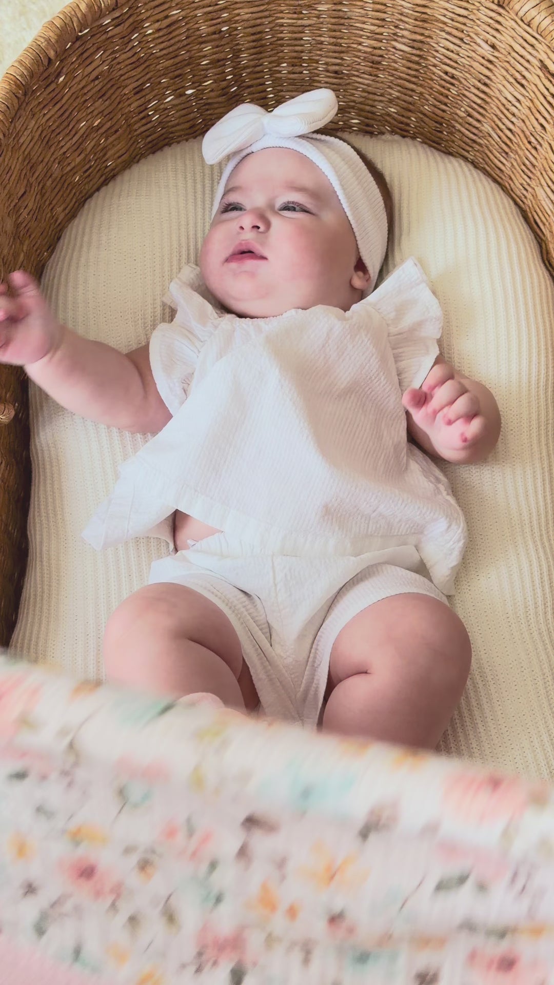 Mouliss personalized pink baby blanket with floral muslin, embroidered name, shown in basket